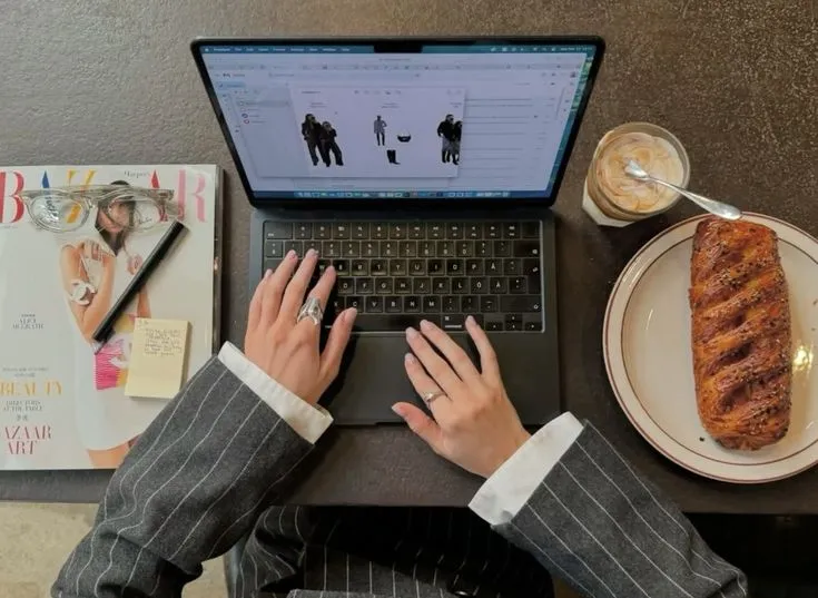Neatly arranged desk with monitor at eye level